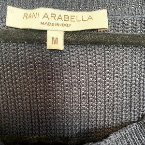 Navy blue sweater. Keeps you warm and breezy. Good material.